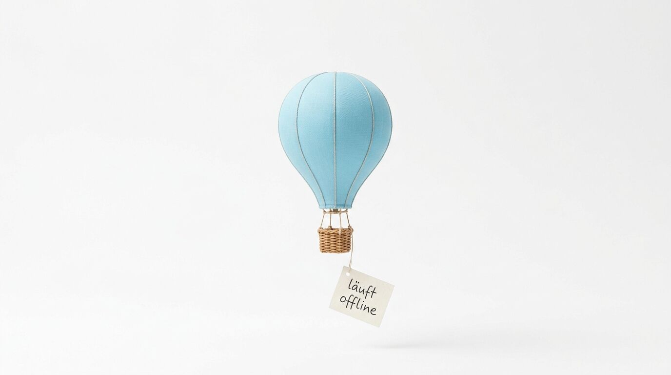 Heißluftballon-Modell mit Korb und Schild „läuft offline“ vor weißem Hintergrund