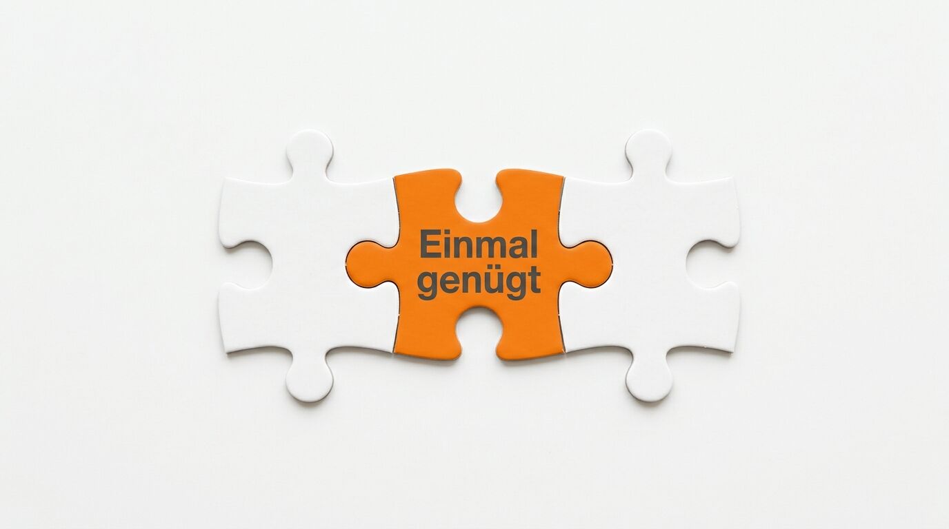 Ein oranges Puzzleteil mit Text 